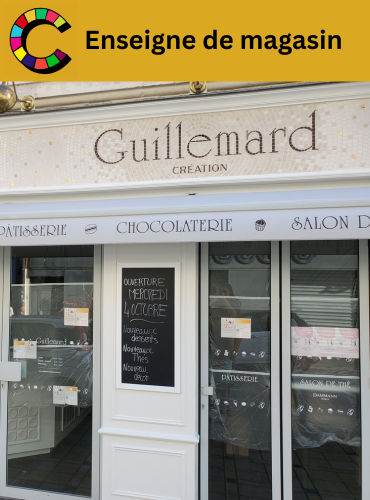 Mosaïque pour une enseigne de magasin. C'est l’enseigne de la pâtisserie Guillemard qui est montrée. Cette pâtisserie se situe à La Flèche (72).